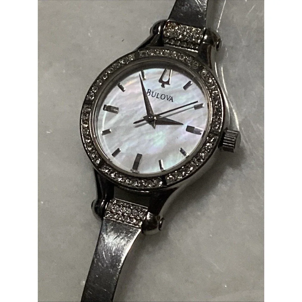 Bulova Women Silver Tone Crystal Bezel Mother Of Pearl Dial Bangle Watch C869915